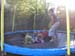 AvynBDayParty2004_BS_MonicaBouncingKidsOnTrampoline